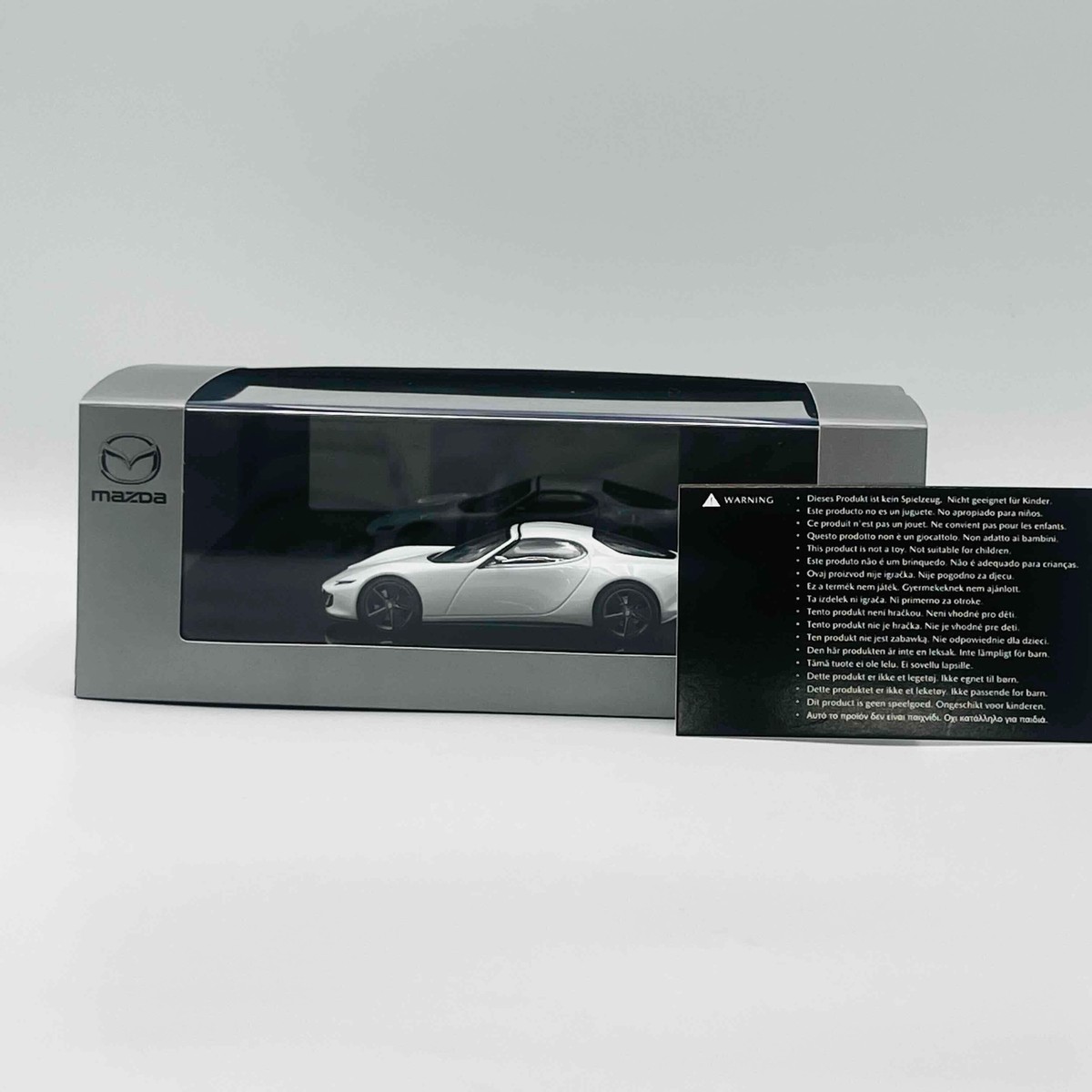 MAZDA ICONIC SP Certified by Mazda Motor Corporation. white collar