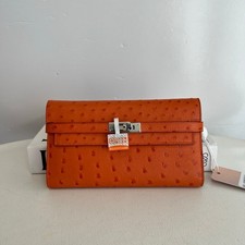 Hermes Kelly wallet, orange with silver hardware, ostrich leather