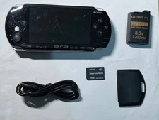 Sony psp 1000 with brand new battery, charging cable and memory stick