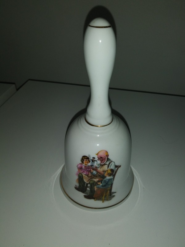 Collectible Bell featuring a Norman Rockwell painting called the Cobbler