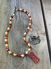 Handcrafted beaded necklace featuring a Chinese carving pendant — photo 2
