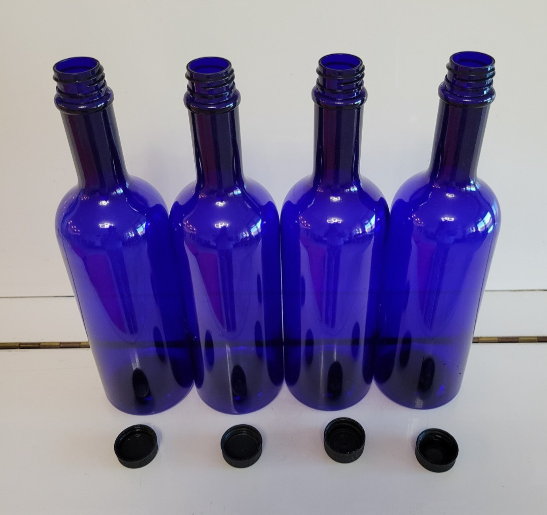 4 COBALT BLUE PLASTIC BOTTLES WITH BLACK PLASTIC LIDS 11 INCHES HOLDS 28 OZS