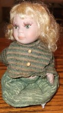 Cute Porcelain Doll 6 Inch Sitting Ump International Holding