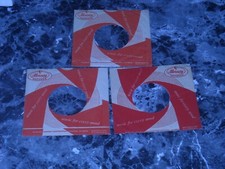 45 COMPANY RECORD SLEEVES. LOT OF THREE EARLY RED SWIRL.