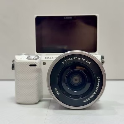 Sony Alpha NEX-5R 16.1 MP Mirrorless Digital Camera with 16-50mm Lens English