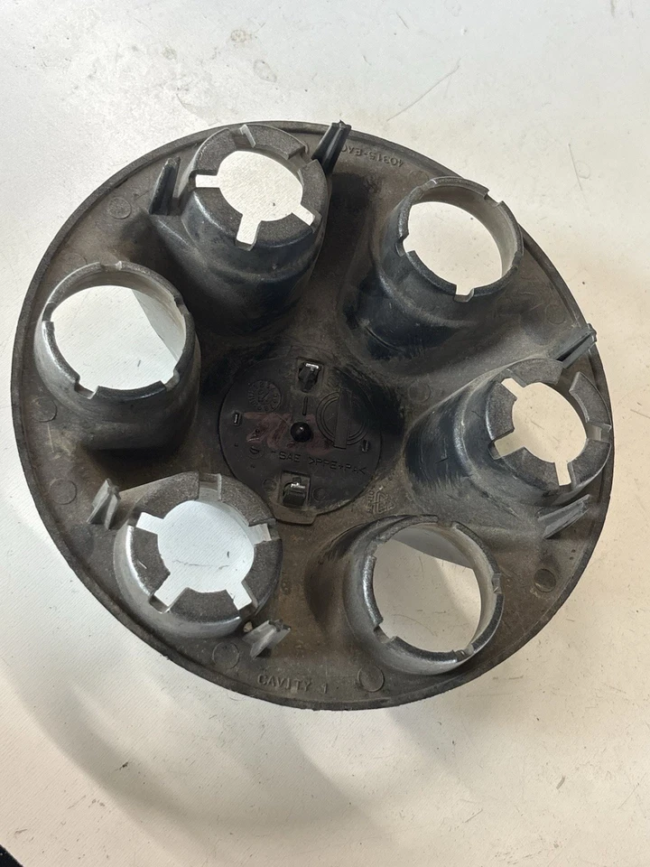 Tapacubos centrales plateados Nissan Titan 2004-2022 40315-7S000 403157S000 Foto 2 de 2