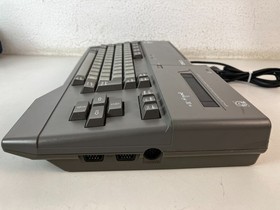 MSX Personal Computer AX230 Model 123 sakhr الفاتح صخر Arabic & English version