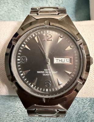 Base Matel Bezel Watch 100 foot Water Resistant Elastic Band Tested And Works