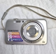 Samsung PL20 Digital Camera 14.2 mp 27mm Wide Angle HD Movie Capable Tested Read