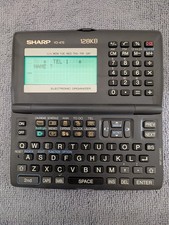 Sharp YO-470 Electronic Organizer 128KB Backlit B&W LCD 80x112 Alarm