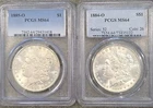 1884-O and 1885-O MS64 Morgans Silver Dollars.