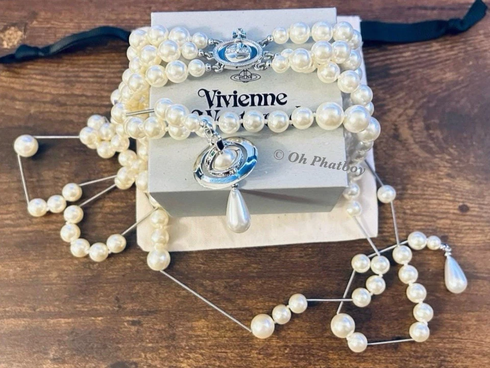 Collar largo Vivienne Westwood plata 3D perlas rotas deformación en capas alrededor.