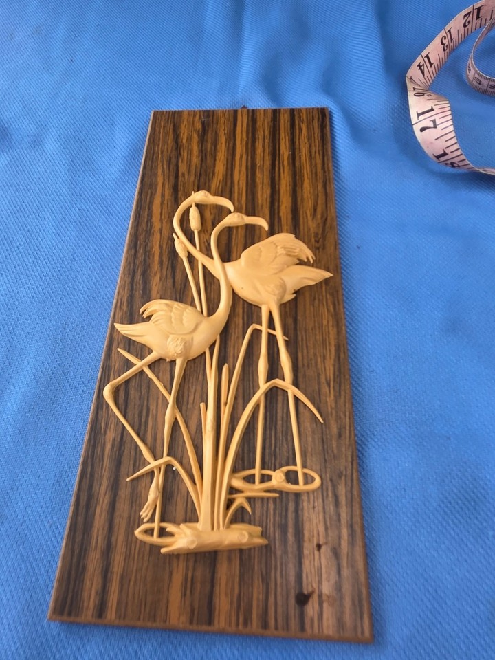 A 1960s German hand-carved wood flamingo wall plaque — genuinely rare, one-of-a-kind folk-art object with serious vintage provenance.