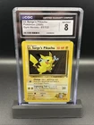 Pokemon TCG: 2000 Lt. Surge's Pikachu 081/132 Gym Heroes 1st Edition CGC 8