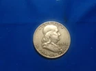 1957-D Walking Liberty Half Dollar (pink/red)