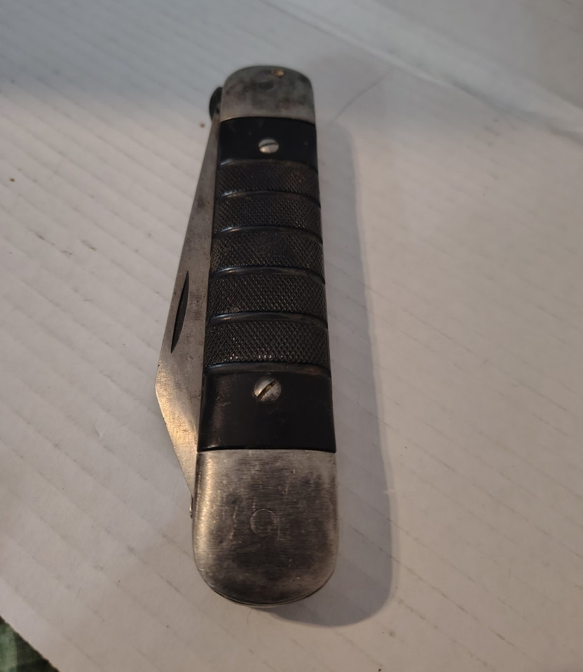 An actual WWII-era U.S. Army Air Forces survival knife/tool — the kind of object that has a real story baked into every scratch and carries genuine military history in your pocket.