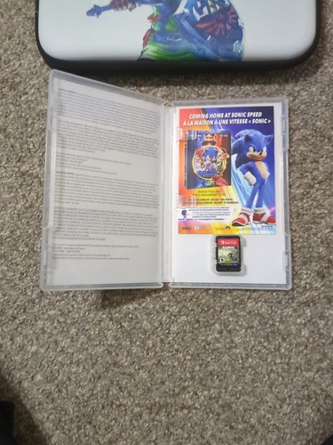 Nintendo Switch Lite Blue With Legend Of Zelda Carrying Case And Sonic Frontiers - Picture 10 of 16