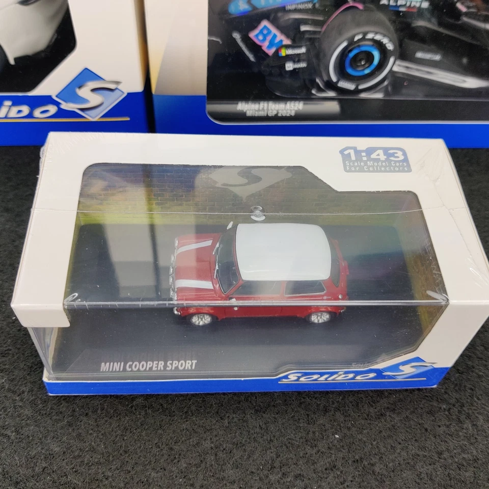 AUTO SOLIDA MINI COOPER 1.3L SPORT PACK NIGHTFIRE RED 1:43 NUOVO.SCATOLA - Immagine 4 di 4