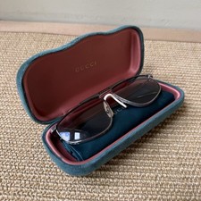 Gucci GG 0915S Rimless Sunglasses Silver Meta...