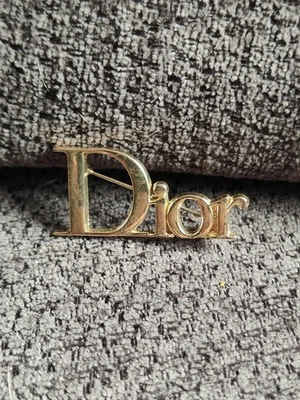 Broche vestiaire Dior Doré - Photo 1/4