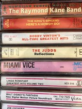 Lot of 57 cassette tapes across lots of artists