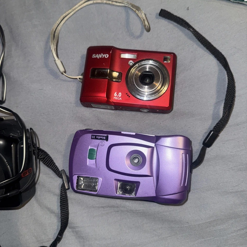 PAQUETE Cámara De Colección Antigua Funcionando, Piezas O Reparaciones Sanyo, Nikon, Ramon One!!!!! Foto 2 de 4