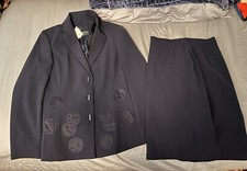 Womens Dark blue suit and skirt with unique pattern.