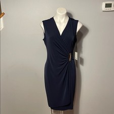 Calvin Klein ladies NWT Navy Blue Faux Wrap Sleeveless Dress. Size 10.