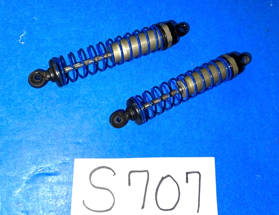 TEAM ASSOCIATED RC10 BUGGY UNUSED REAR HARD COATED SHOCKS WITH BLACK METAL CAPS - Image 3 of 4
