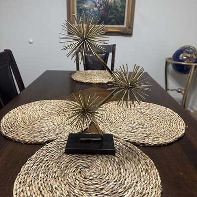 Gold Starburst mounted on black marble