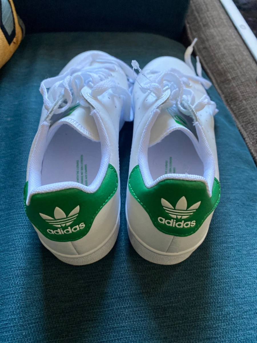 Green white adidas sneakers |