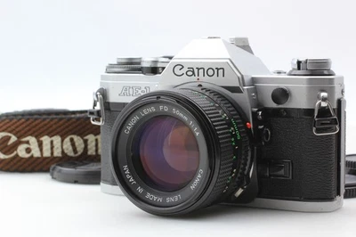 Lente CLA [Casi COMO NUEVA + Correa] Canon AE-1 Plata Nueva lente FD 50mm... - Imagen 1 de 4