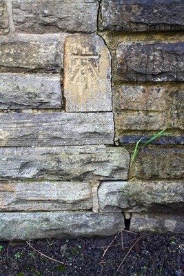 Photo 6x4 Benchmark on #414 Skipton Road, St John's Road face Keighley Or c2017