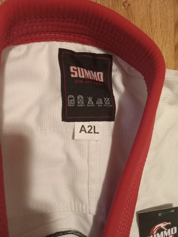 Chaqueta BJJ Gi Hombre Blanca A2L Pantalones A1H | Uchiha Naruto | Excelente Estado Foto 4 de 4