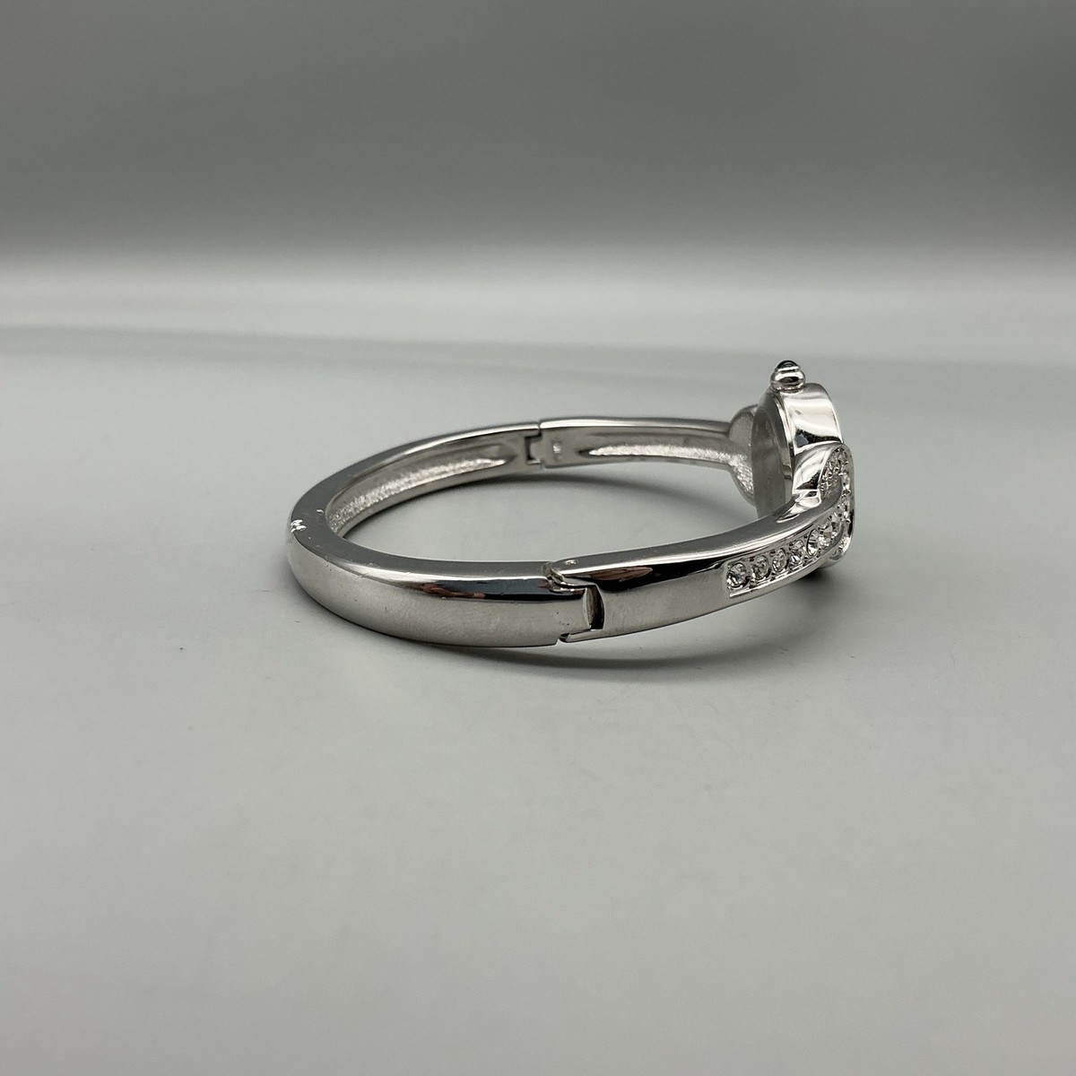 Nolan Miller Womens Watch 21mm Silver Tone MOP Dial Bangle  display picture 2