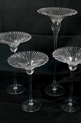 4 Vintage home essentials tall stem, glass candle holder.. beautiful flower look