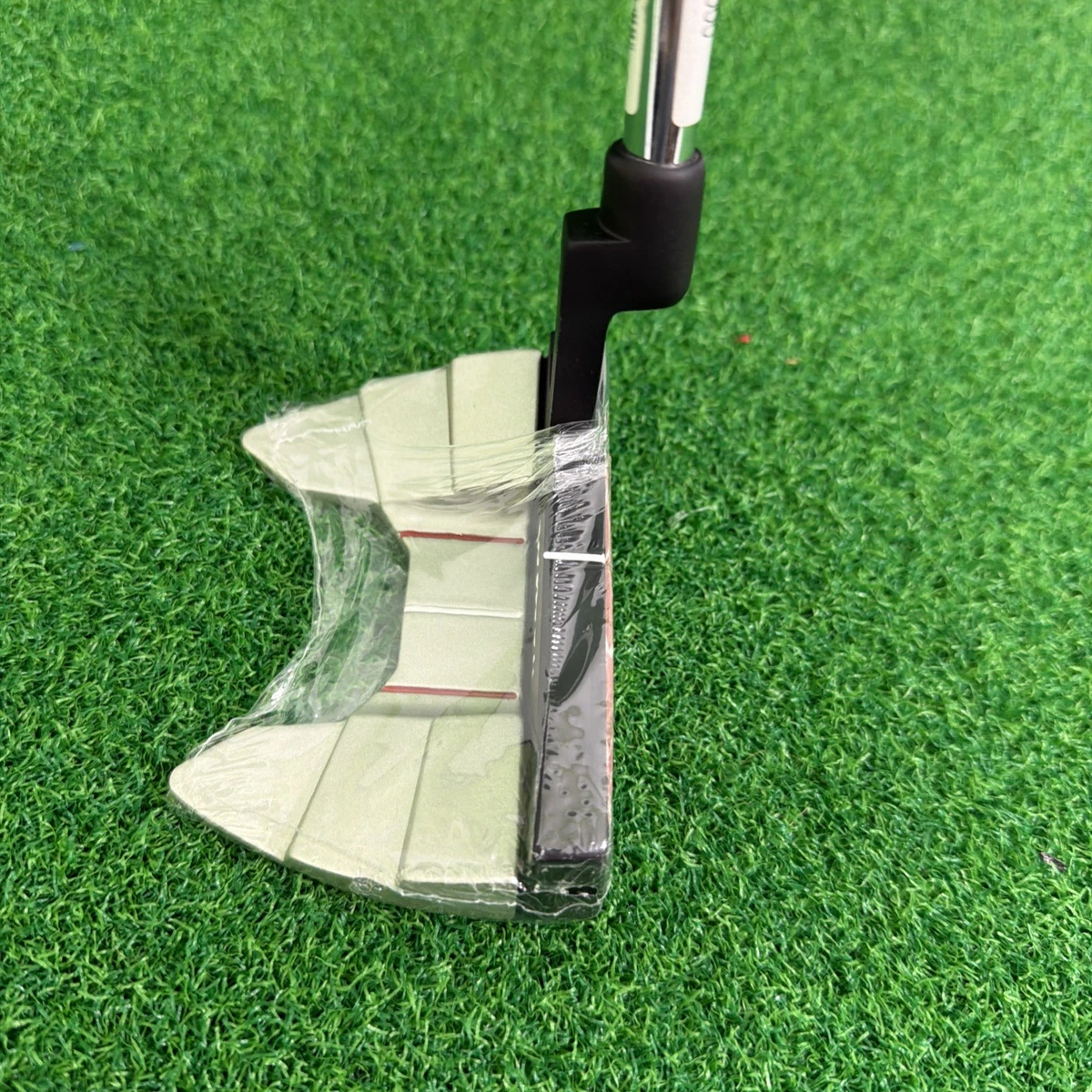 A Vintage Wilson Harmonised 001 Contoured Hollow back Blade R/H Putter