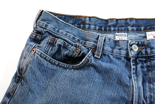 Blue and white VTG Lucky Brand jeans with brown paint splatter on right leg, 34x30 medium wash, and red back patch.