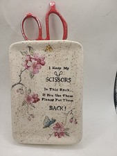 Wall pocket for scissors in floral w flecked ceramic. Hand painted. "I Keep...