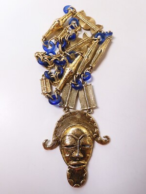 Exotic Vintage Gold Tone Necklace With African Mask Pendant & Blue Glass Rings