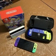 Nintendo Switch OLED Splatoon 3 Edition with case and grips