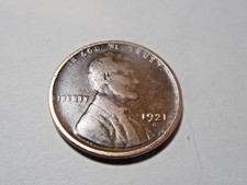 1921 S Lincoln Cent, in about VG condition.  Good coin.  But you decide!!!!!