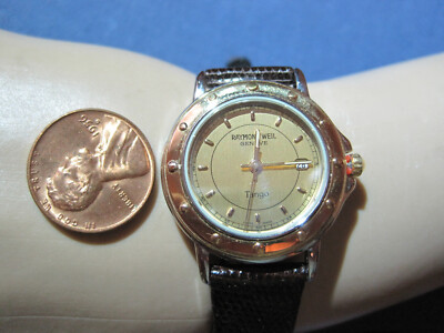 H97.  ladys stainless steel and gold plate RAYMOND WEIL tango date watch