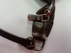 neverfull clutch strap