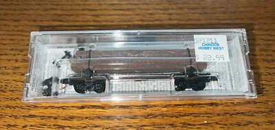 N Scale Micro-Trains MTL 113010 Unlettered 40' Skeleton Log Car w/ Load #1