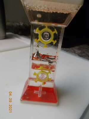 Unbranded Working Red Liquid Spinning Wheel Desktop Amusement Relax Flip Device