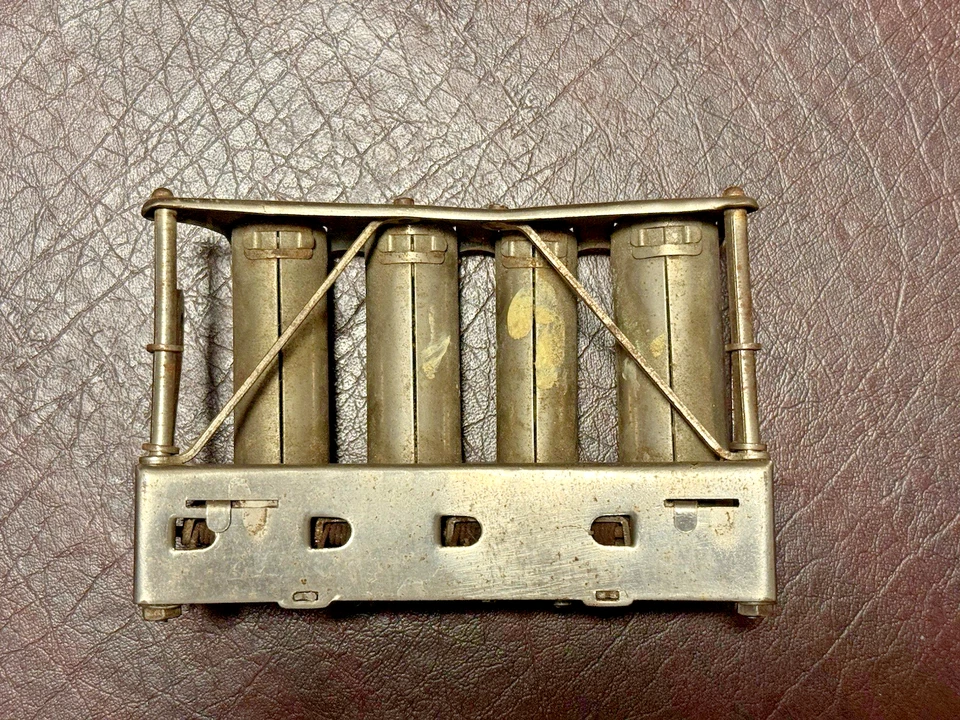 Dispensador de monedas McGill vintage Foto 2 de 4