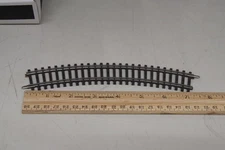 Marklin 2221 HO K track; 14-3/16" Radius.   Price is per piece.