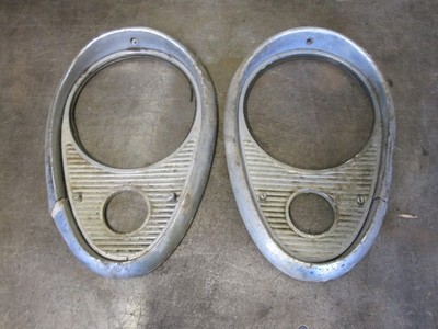 53 54 BUICK LEFT RIGHT HEADLIGHT TRIM BEZELS SURROUNDS OEM PAIR