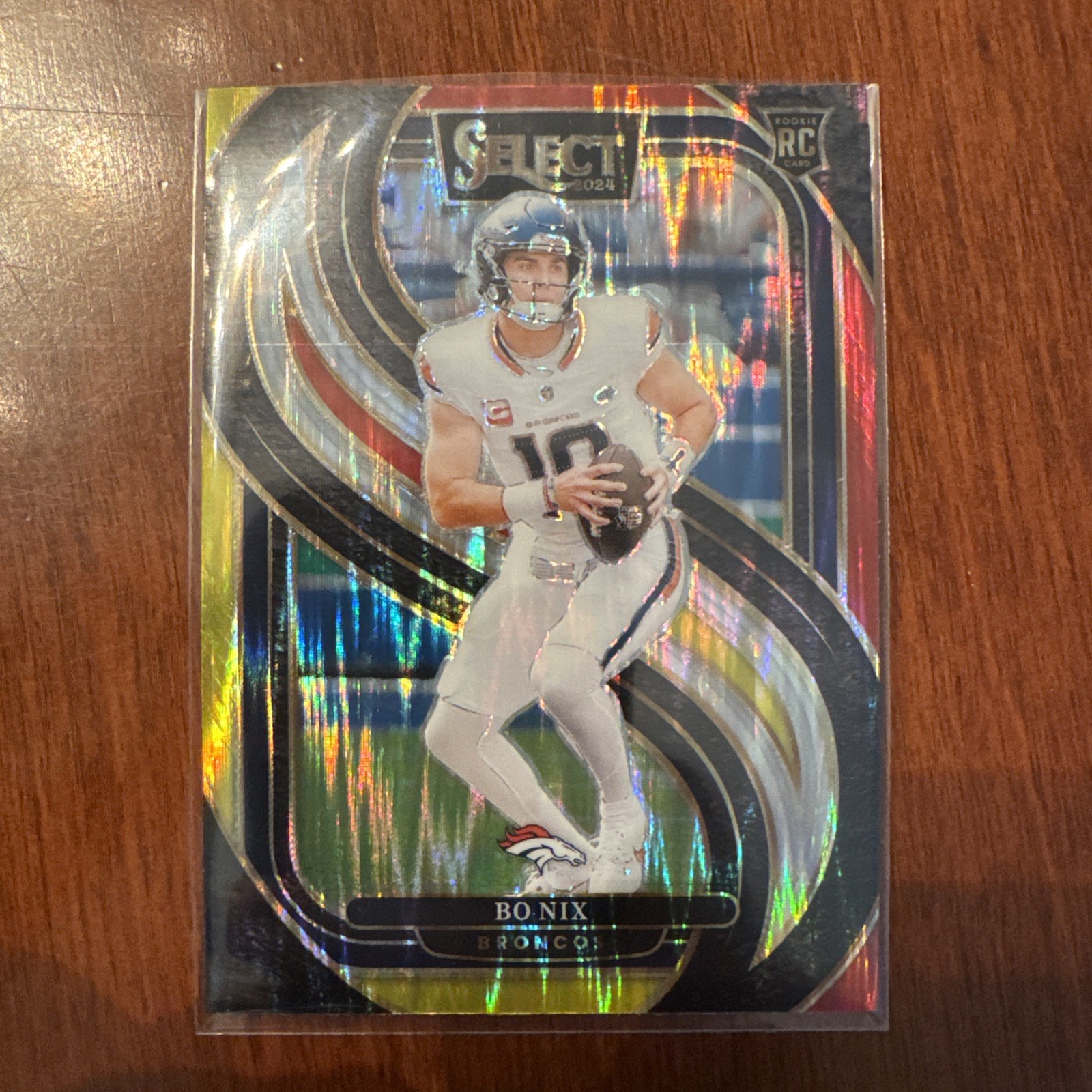 2024 Panini Select - Premier Level Bo Nix #117 Red & Yellow Shock Prizm (RC)